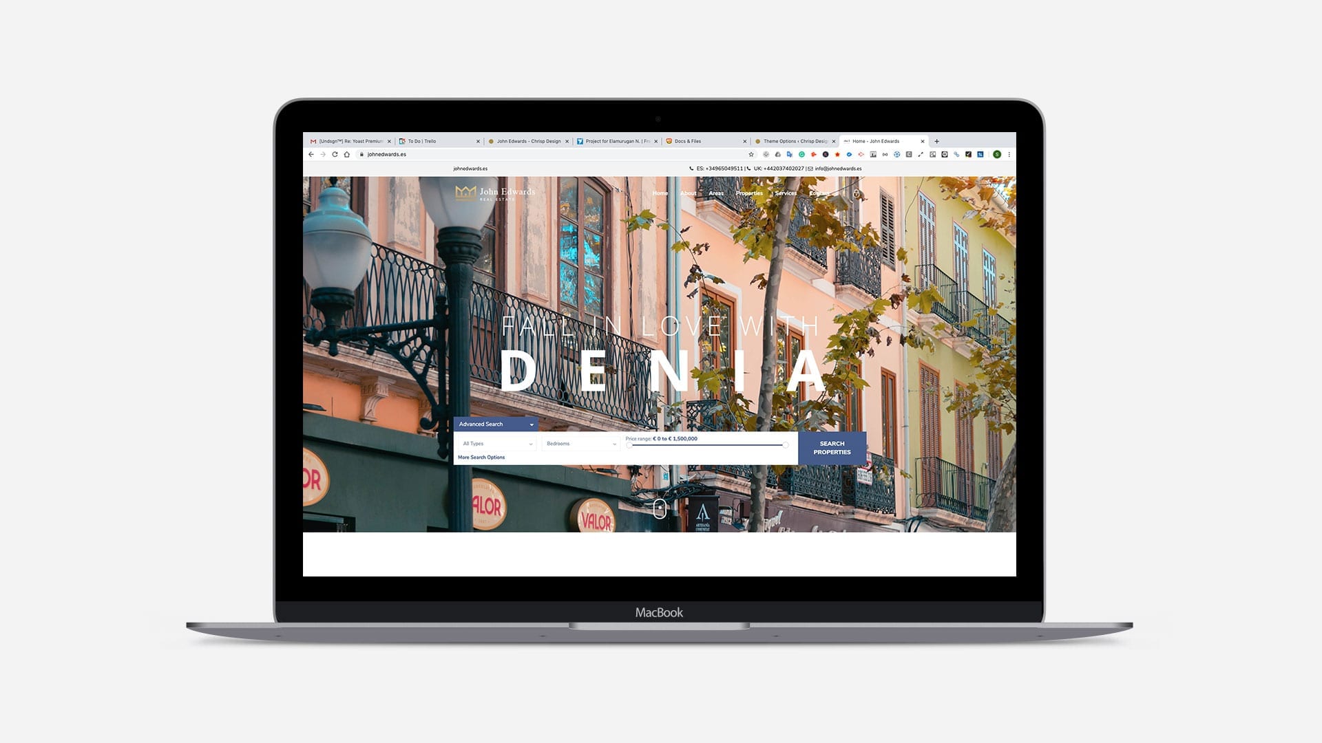 macbook view of website denia